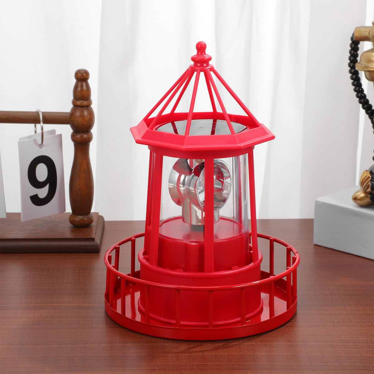 Solar Powered Red Lighthouse Figurine with Rotating Garden Light C323929